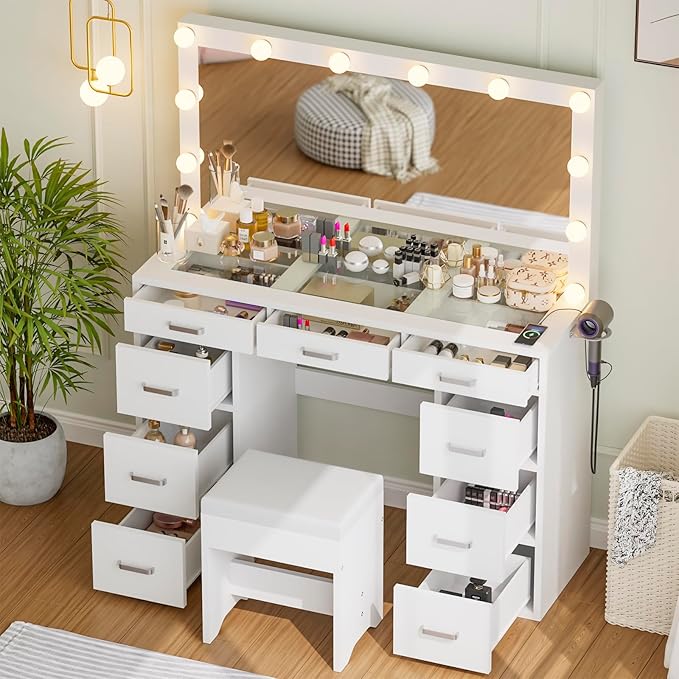 Likein Vanity Desk with Mirror and Lights, 47‘’ Glass Top Vanity with Power Strip, 9 Drawers Makeup Vanity with Lighted Mirror and Chair, 3 Lighting Modes Adjustable Brightness